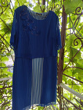Нарядна сукня з шифону прикрашена стразами. Синій шифон на чохлі з білої тканини у синю смужку. Киев