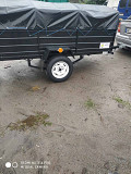 Купить новый одноосный прицеп Днепр-21 и другие модели.тент и брызговики в подарок из г. Лубны